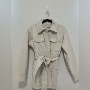 Oversized jacket very cute just too big. Never worn brand new.